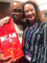 Carrie Pettus-Davis and Lamont Carrey with his book 'Dead Before 18: Saving our boys from the Streets'.