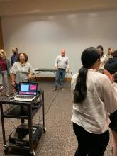 Bill Rone leading his fellow PMFs in a group training activity.