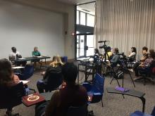 Post Master's Fellows listening to the feedback from a former participant of the 5-Key Model.