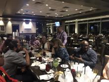 The team playing dinner games post-event.