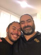 CSW Doctoral Program Director and IJRD Associate Director, Stephen Tripodi, posing for a picture with rock star doctoral student Brian Mai at the celebratory potluck for the incoming doctoral program cohort.