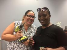 IJRD ladies of all trades! Picture is administrative associate, Donna Tillis-Radcliff, and project coordinator, Anghela Kane, fixing up the shop!