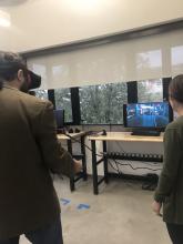 Stephen Tripodi and Tanya Renn trying out Virtual Reality technology.