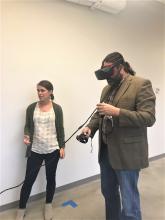 Stephen Tripodi and Tanya Renn trying out Virtual Reality technology.