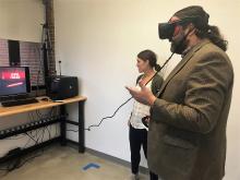 Stephen Tripodi and Tanya Renn trying out Virtual Reality technology.